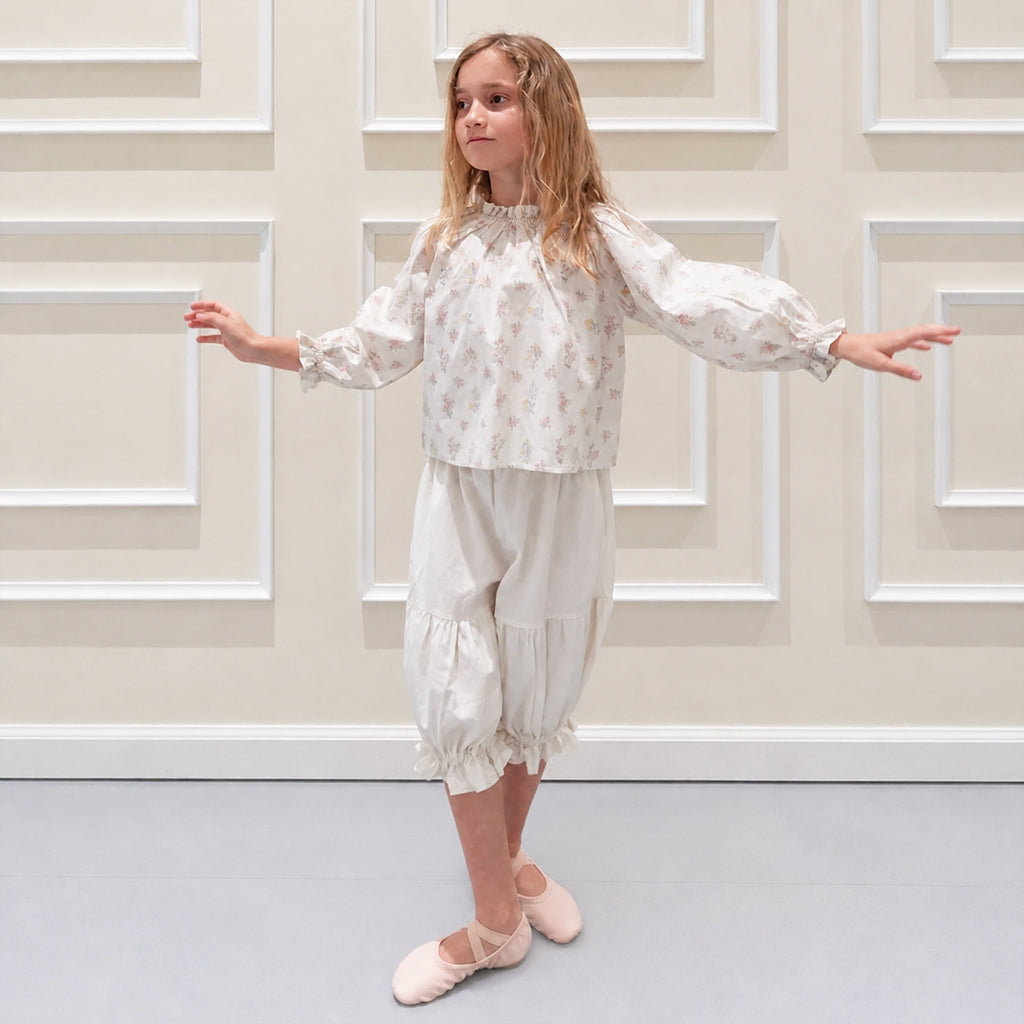 Child wearing NOU NOU Judy Wide-Leg Cotton Pants in Ivory