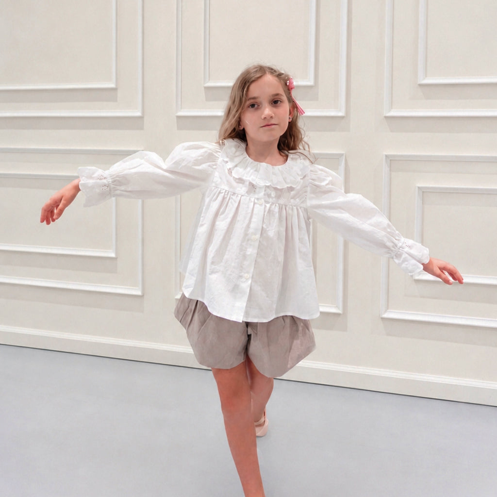 Child wearing NOU NOU Miu Wide Culotte Shorts in Beige