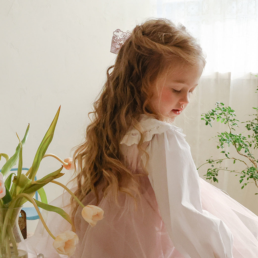 Child wearing Puella Flo Madeline Ribbon Hair Clip in Pink
