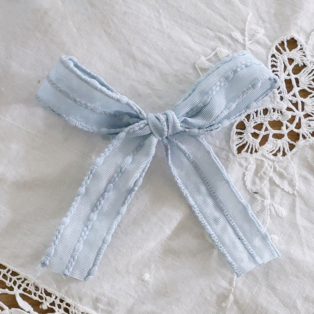Puella Flo Rabi Daisy Hair Pin Blue – girls hair accessory close-up detail