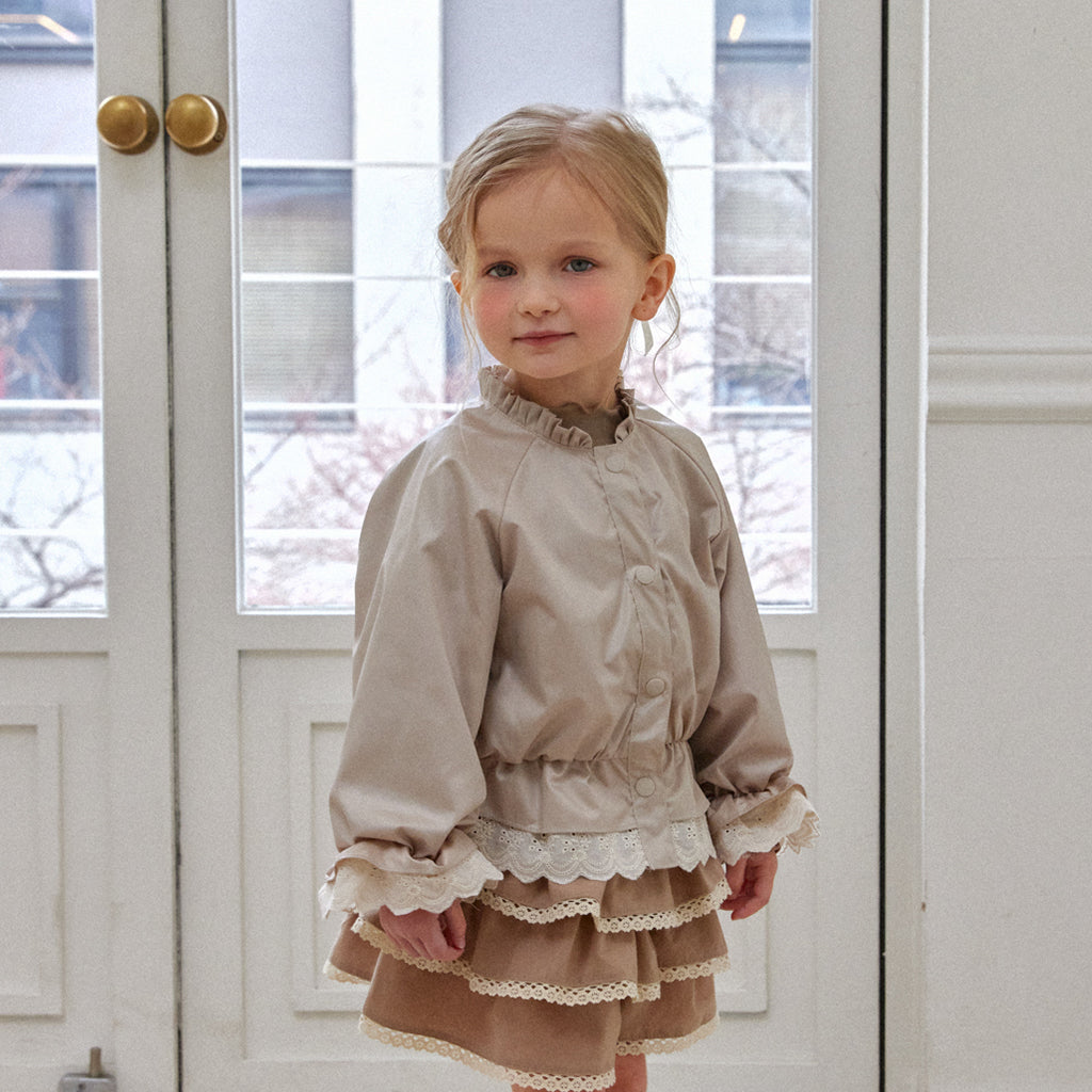 ROA Ruffle Trim Windbreaker Jacket in Beige | poly-nylon blend girls top | Victoria Kids Wear