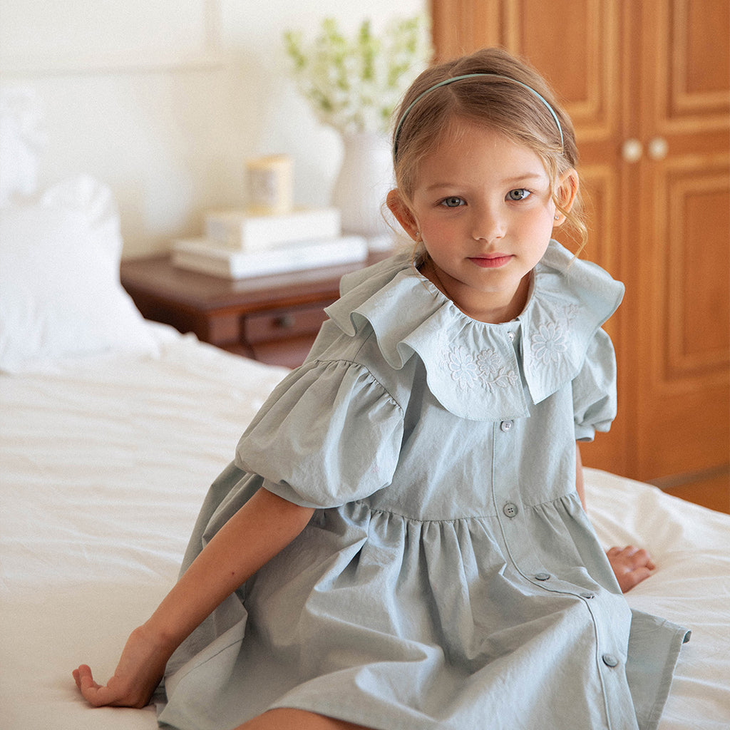 Child wearing NOU NOU Flower Jeanne Pleated Midi Dress in Blue