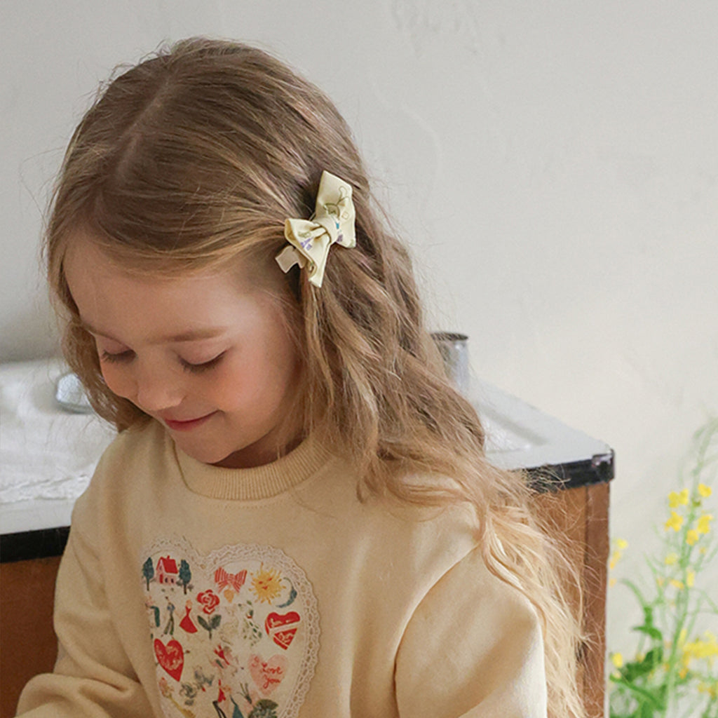Puella Flo Teddy Knot Hair Clip Yellow – girls hair accessory close-up detail