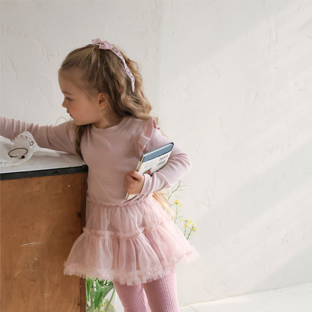 Child wearing Puella Flo Mitchell Lace Bow Hair Clip in Pink