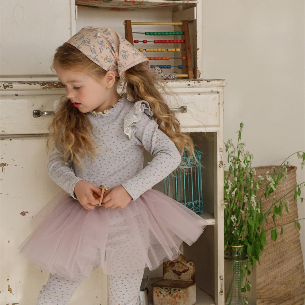Child wearing Puella Flo Arona Scarf Pattern B in Pink
